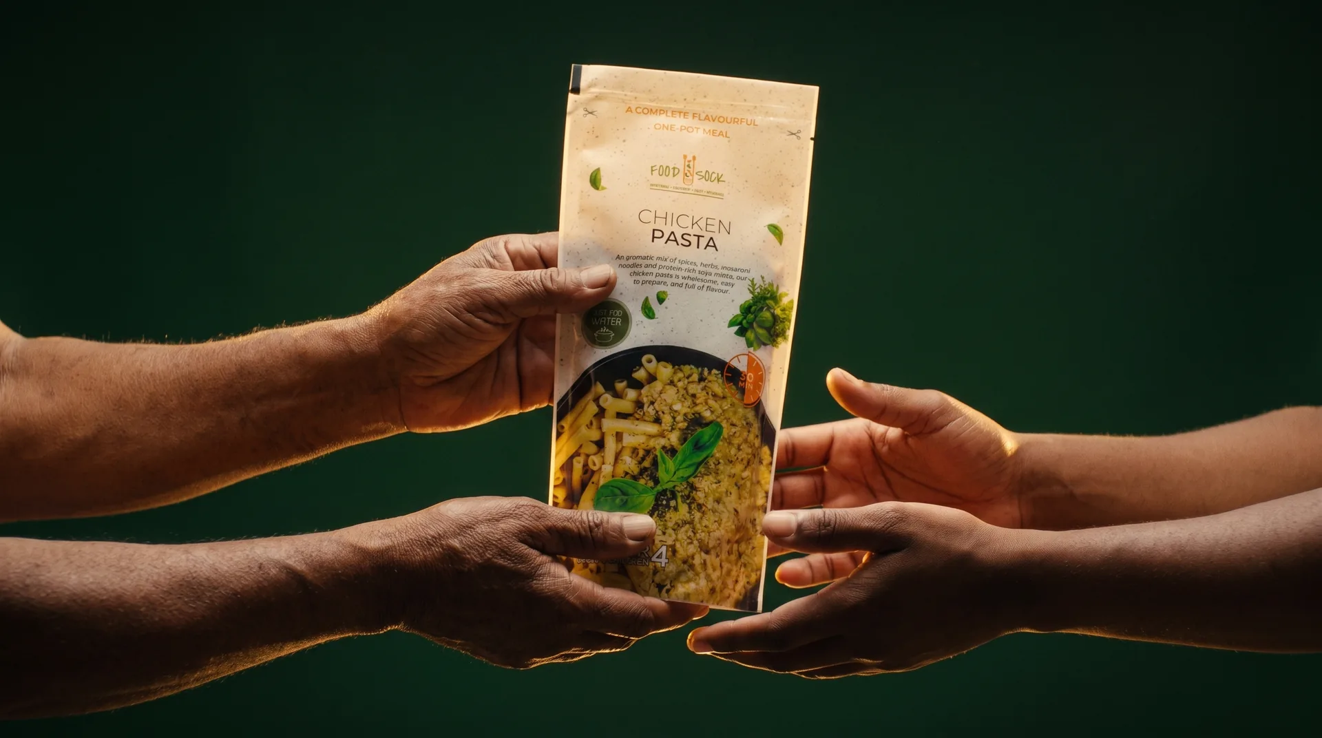 Illustration: hands passing a Food Sock meal pouch to another pair of hands